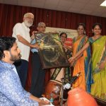 Smt Vasanthalaxmi Hebbar presenting the painting of Hanuman to Akkarai Shubhalaxmi