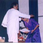 Ranjani receiving the Tambura prize from Sri RK Padmanabha